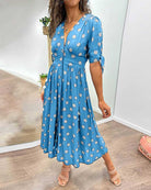 ANKA | Polka dot dress with flared hem and accentuated waist